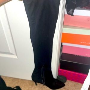 Sleek black over the knee boots. Comfortable with a cute heel